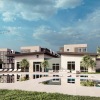 a building with a pool in front