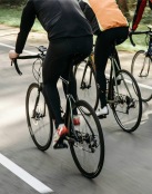 a group of people riding bikes